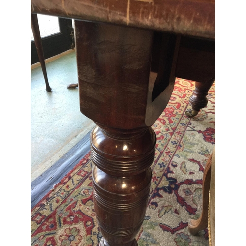 56 - A late Victorian/Edwardian mahogany extending dining table, rounded rectangular moulded top, turned ... 