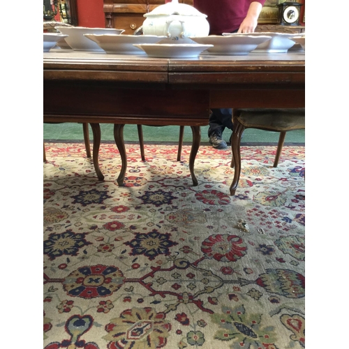 56 - A late Victorian/Edwardian mahogany extending dining table, rounded rectangular moulded top, turned ... 