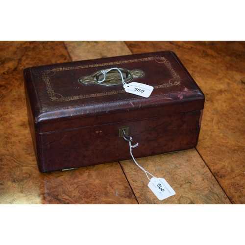 560 - A Victorian tooled and gilt morocco leather rounded rectangular dressing box, hinged cover with inse... 