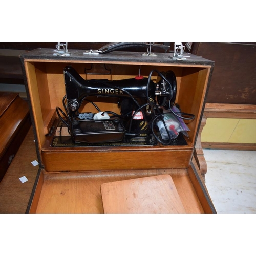 598 - A Singer sewing machine, no EK054619, cased