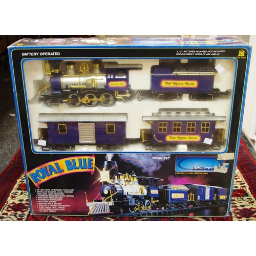 106 - A Toy State Royal Blue Train Set no. 6086 comprising engine, tender, box car, caboose, 20ft of track... 