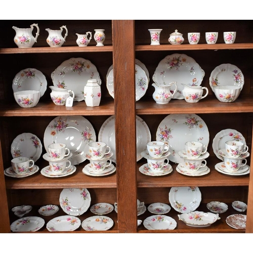 123 - A Royal Crown Derby Posies pattern part tea service, comprising cups, saucers, side plates, milk jug... 