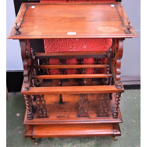 128 - A 19th century Canterbury whatnot, moulded rectangular top with turned urnular finials above a three... 