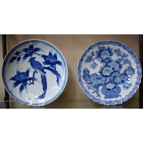 142 - A late 19th century Oriental plate, bird on branch; another, similar, Prunus and Chrysanthemums (2)