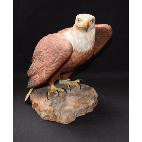 151 - A Royal Crown Derby model, of an Eagle, black inscribed and red printed marks, boxed en suite (A/F),... 