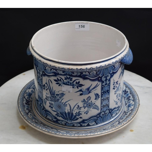 156 - A late 19th/early 20th century Dutch Delft jardiniere and stand, blue and white floral decoration, 2... 