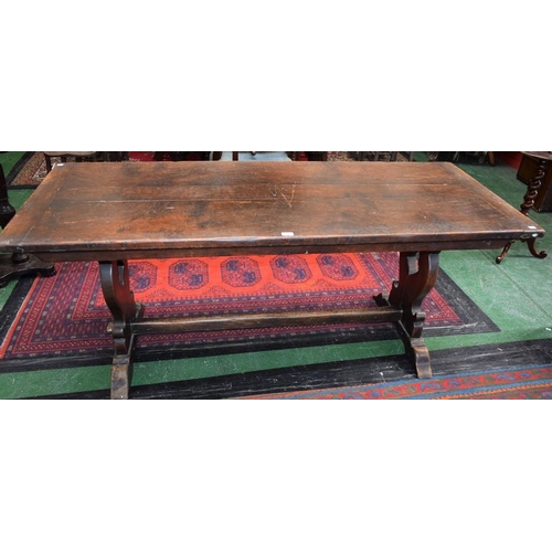 158 - An 18th century oak refectory style, trestle type dining table, rectangular top, vasular end support... 
