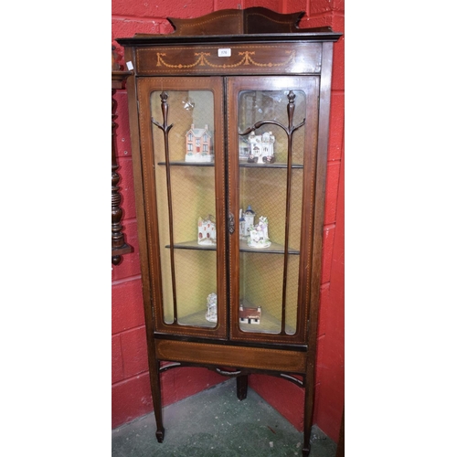 176 - An Edwardian mahogany floor standing corner display cabinet, shaped gallery above a frieze inlaid wi... 