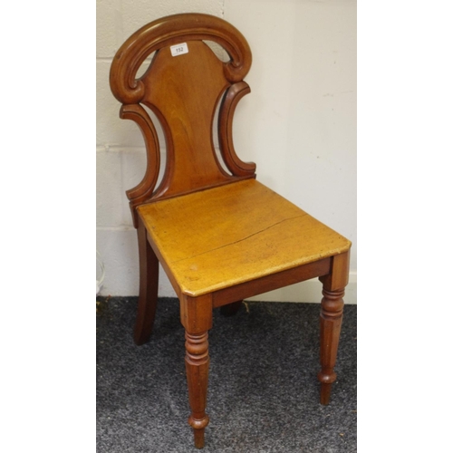 152 - A mid 19th century mahogany hall chair, shaped and pierced back,  wooden seat, tapering octagonal fo... 