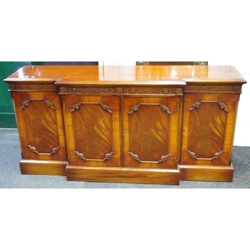 155 - A reproduction mahogany Wade Furniture Ltd. break front sideboard