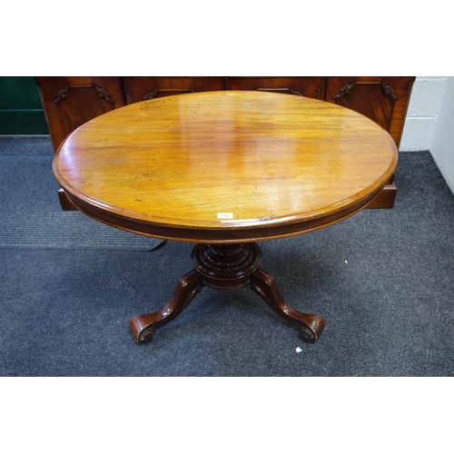 156 - A Victorian mahogany breakfast table, oval top, cockbeaded frieze, tapering octagonal column, circul... 