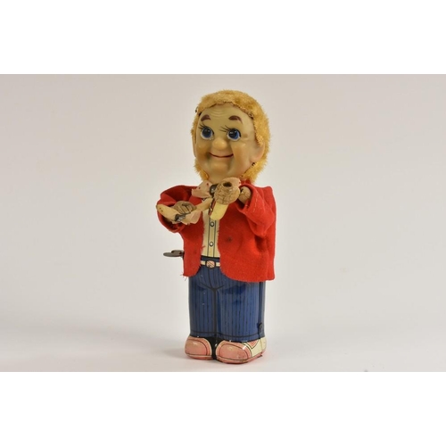 105 - TN Toys, Japan,  Mr Dan The Hot Dog Eating Man, mechanical clockwork tinplate novelty figure, wearin... 