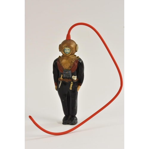 11 - A rare Saxon Tower Toys, The Diver, plastic and celluloid, with red rubber tube, c.1940