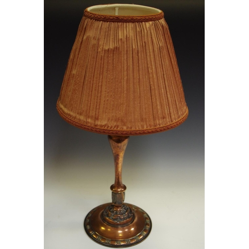 163 - A copper Art and Crafts style table lamp.