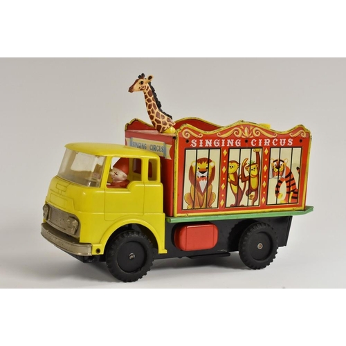 113 - A Tommy Toy, Japan, tinplate and plastic Singing Circus,  battery operated