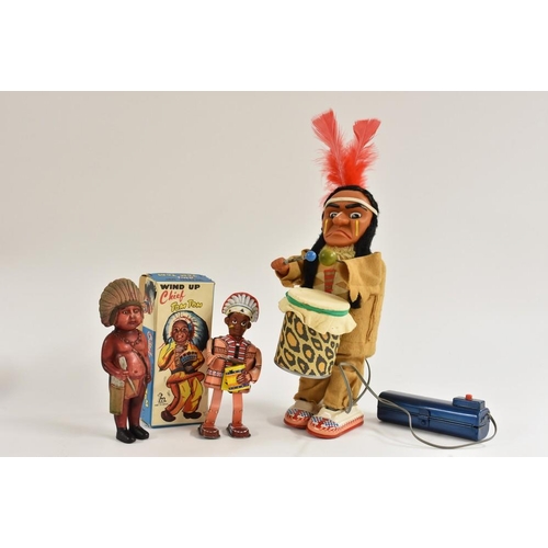 118 - A Drumming Indian, battery operated, walks and drums, 1950's; Chief Tim Tom, windup toy, made in Jap... 