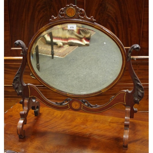 175 - A Victorian mahogany dressing mirror, shaped pediment, fan shaped cartouche, oval bevel edged mirror... 