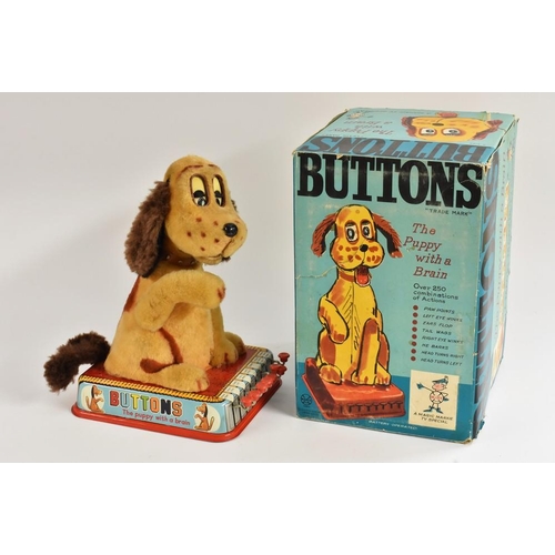 123 - A Marx Toys tinplate  Buttons, puppy with brain, battery operated,  in original box