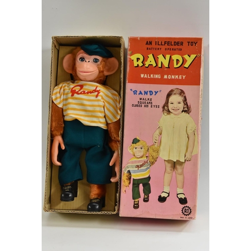 124 - A Illfelder Toys, Japan, Randy The Walking Monkey,  battery operated, tinplate,  boxed