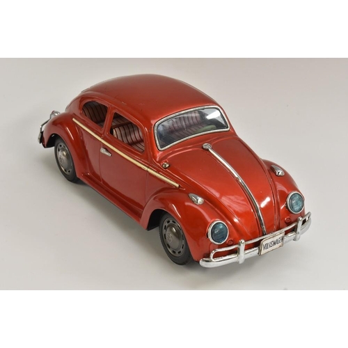 127 - Volkswagen car, tinplate, battery operated, engine lights up and moves; Bump and Go Action, made in ... 