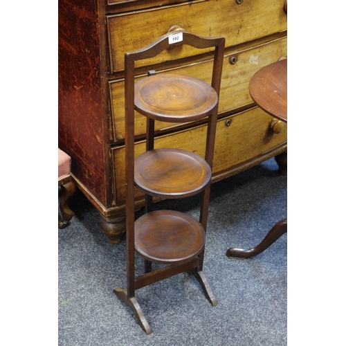 192 - An early 20th century mahogany three tier cake stand