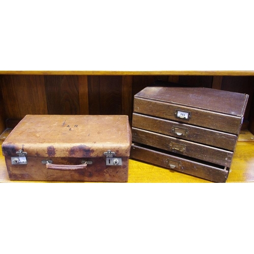 193 - A late 19th/early 20th century leather suitcase monogrammed A R L; a 1940s oak collectors/watch make... 