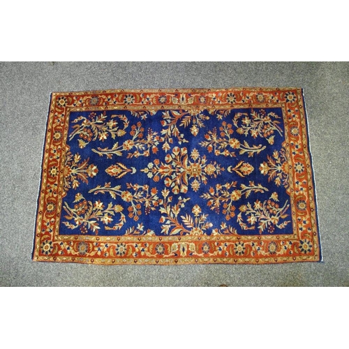 197 - A Sarough carpet, West Persia, cobalt blue madder field, stylised flowerheads, conforming border, 1.... 