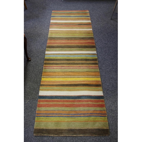 198 - An Indian hand loomed wool runner , retailed by John Lewis, 240cm x 70cm