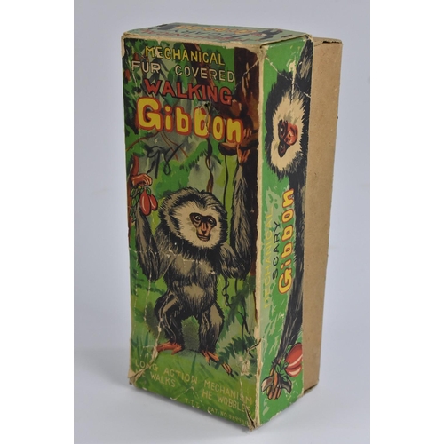 135 - A TTT, Japan Mechanical Fur Covered Walking Gibbon,  in original box