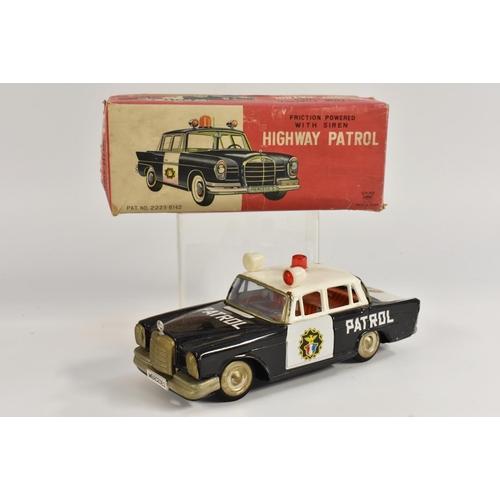 141 - An Ichiko, Japan,  a tinplate Highway Patrol car, friction, in original box