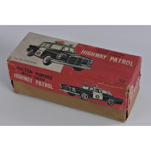 141 - An Ichiko, Japan,  a tinplate Highway Patrol car, friction, in original box