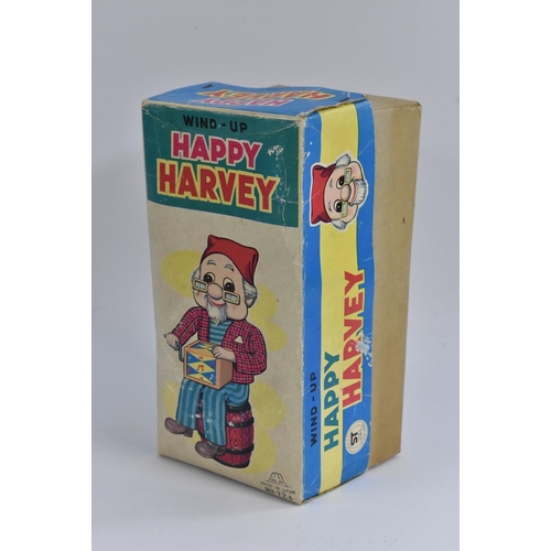142 - A Japanese Happy Harvey, tinplate and plastic, original box