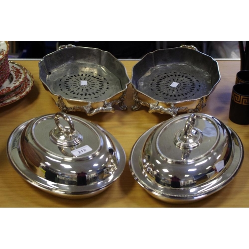 212 - Silverplate - A pair of late 19th century oval tureen and covers, surmounted with cooed vine, gadroo... 