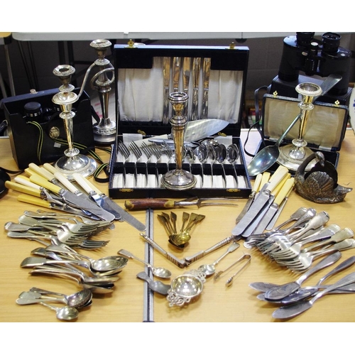 214 - Silver & Silverplate - a silver candlestick, hallmarks rubbed; three branch candleabra; cutlery; a p... 