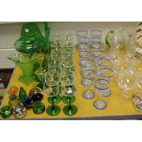 229 - Glassware  - green stemmed hock glasses; green glass oversized goblets; a green glass slender specim... 