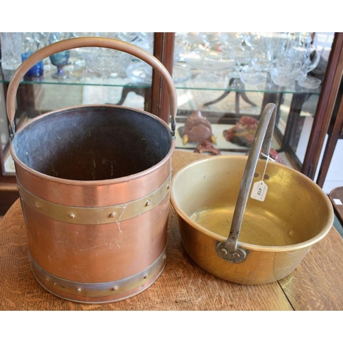 418 - A copper and brass bound log bin; a brass jam pan (2)