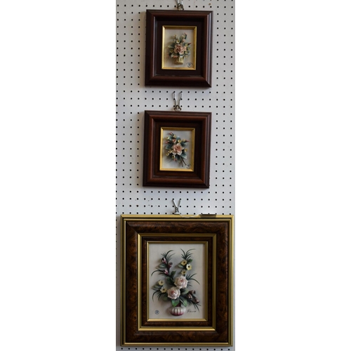 424 - Capodimonte - a rectangular floral wall panel, printed marks; a smaller pair, conforming (3)