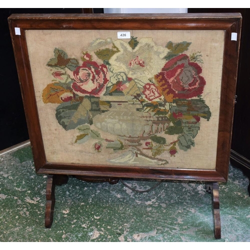 426 - An early 20th century mahogany framed fire screen, adjustable rectangular glazed panel, rectangular ... 