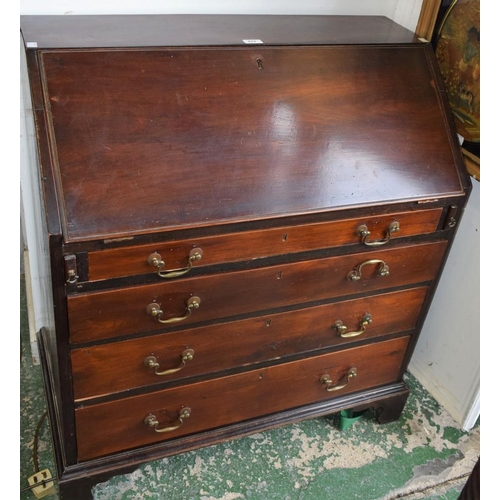 429 - A 19th century bureau, fall front enclosing a fitted interior centred by a cupboard door and small d... 