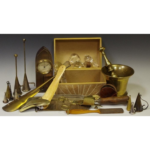 264 - Boxes & Objects - An early 19th century pestle and mortar; a Zehntel-Millimieter scale; brass cowboy... 