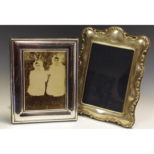 267 - A silver photograph frame Sheffield 1995, 21cm x 15cm; another silver photograph frame, Sheffield 19... 