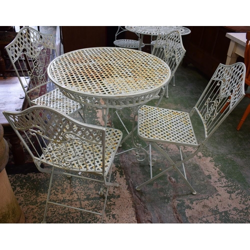 452 - A contemporary cast metal garden table; a set of four conforming chairs (5)