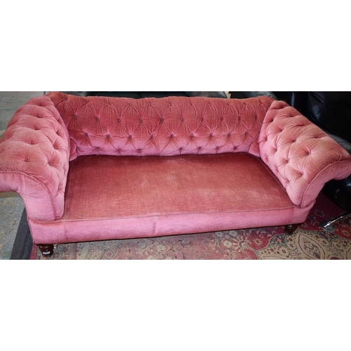 453 - A Victorian button back sofa, c.1860