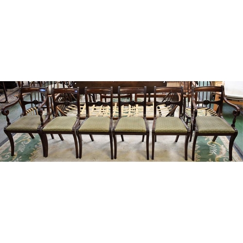 456 - A set of six reproduction mahogany dining chairs, comprising two carvers and four side chairs (6)