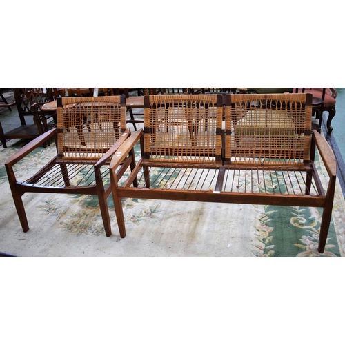 459 - A Danish teak two seat sofa; a conforming armchair, each with woven cane backs, the sofa 128cm wide ... 