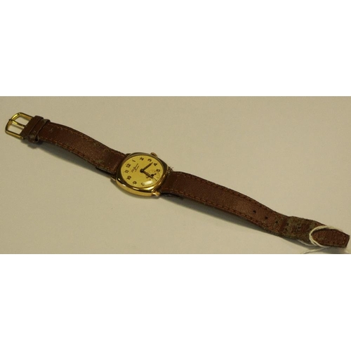 292 - A J. W. Benson 9ct gold gents wristwatch inscribed to verso, presented to E.Tideswell 1957; leather ... 