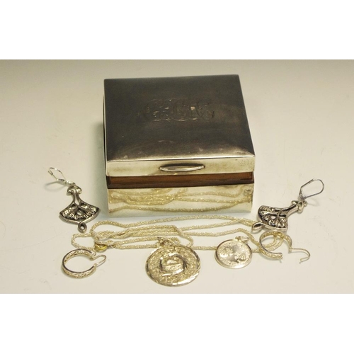 297 - A silver cigarette box, silver pendants, silver earrings, white metal earrings.