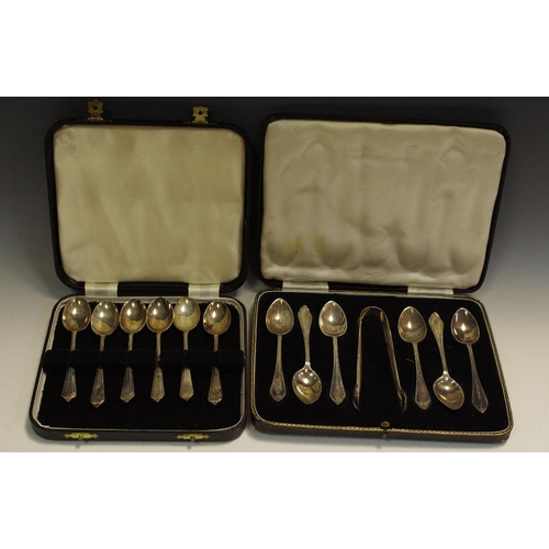 304 - a set of six silver teaspoons, cased; a set of six James Dixon silver teaspoons and sugar tong set, ... 