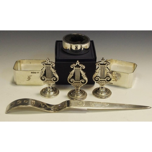 309 - Silver - a pair of rectangular napkin rings, Sheffield 1945, letter knife, botice drip stopper, etc,... 