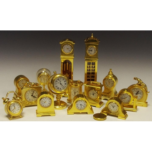 323 - Miniature Clock - various brass clocks in different styles, including a longcase, alarm clock, mante... 